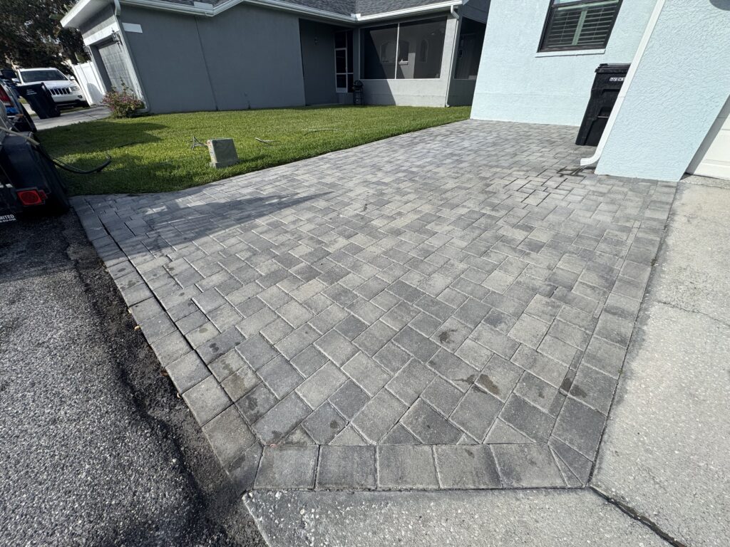 Why Joint Sand Washes Out of Pavers After Florida Rain 3 Unsealed paver driveway extension before sealing