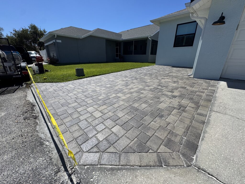 Why Joint Sand Washes Out of Pavers After Florida Rain 2 Sealed paver driveway extension by True Seal Paver Sealing